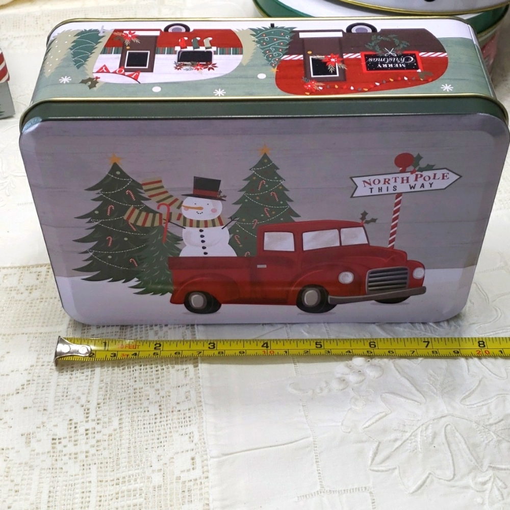 Nesting tins red truck Christmas deco is 2 sets 2 @7.5"x 5.25") &  2 @6.5"x4.5)